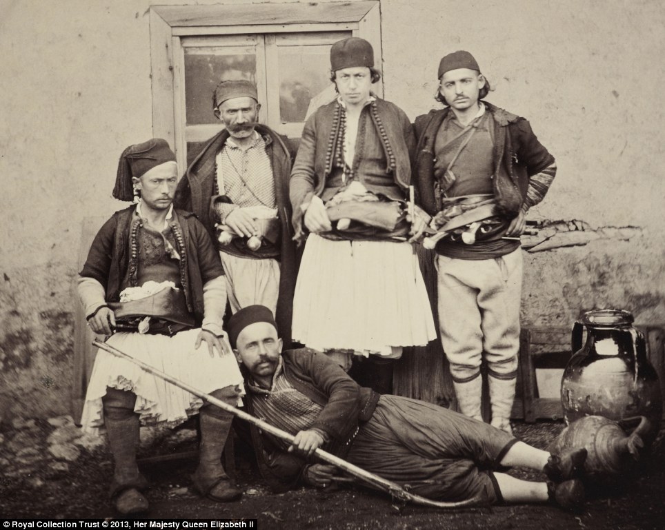 Fez-tive guides: Albanian guides with their 'fez & white petticoats', pictured in Durazzo in February leg of the Royal tour which the Prince described as 'picturesque' in his journal